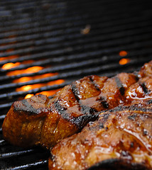Photo of barbecue ribs on the grill
