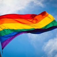 Rainbow flag waving in the breeze.