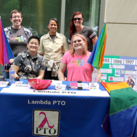 Lambda group at their table on Community Day