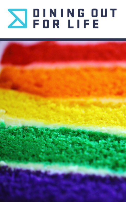 Image of a rainbow layered cake with the logo for Dining out for life as a banner on top
